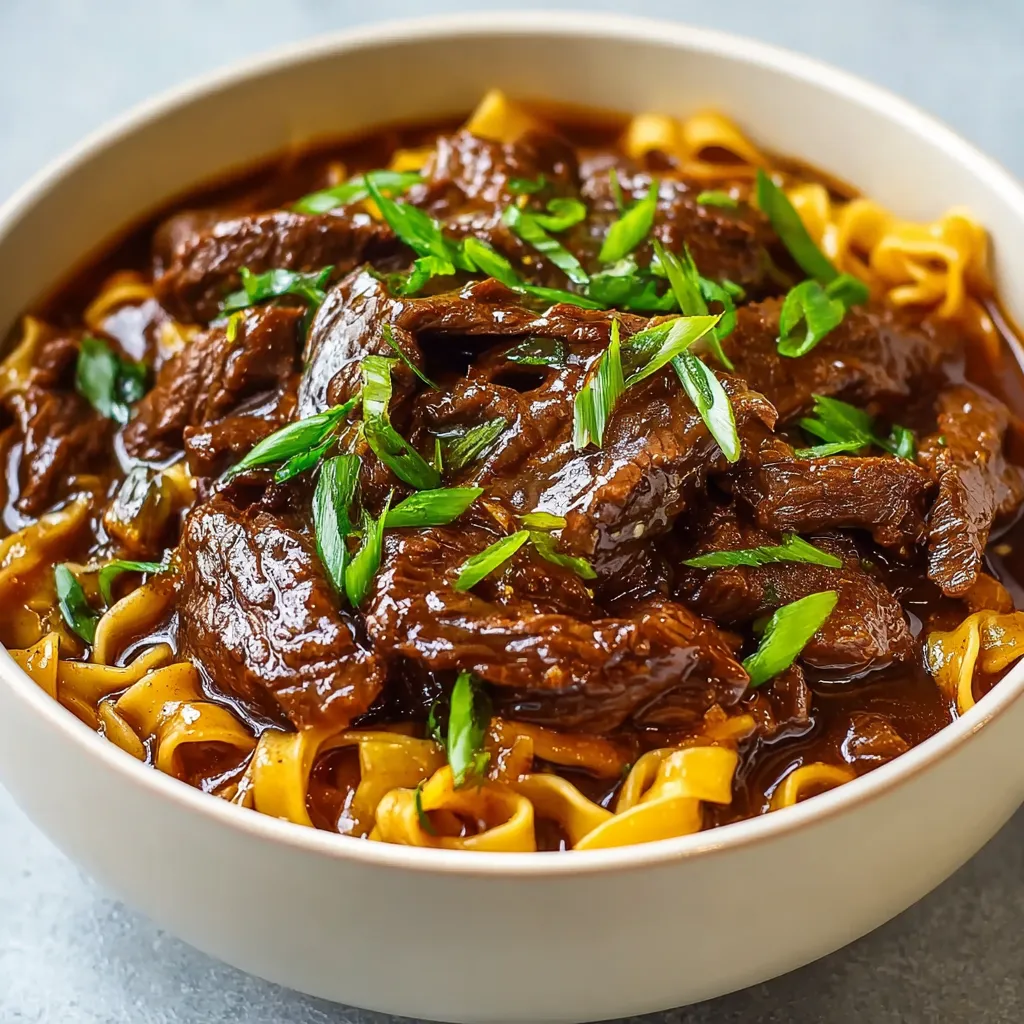 Close-up shot showcasing the delicious details of Korean Beef Noodles, a popular dish.